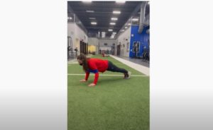 coach alli demonstrates push up form